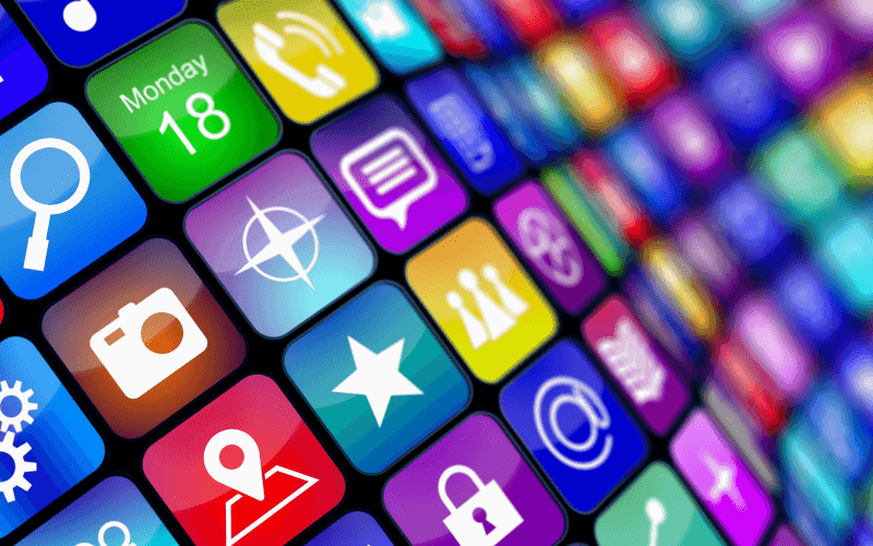 A vibrant array of colorful app icons on a digital interface, featuring symbols like a magnifying glass, camera, chat, and lock, conveying technology and connectivity.