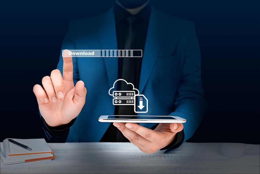 Person touching virtual cloud security interface on tablet device, highlighting our free data egress transfer service.