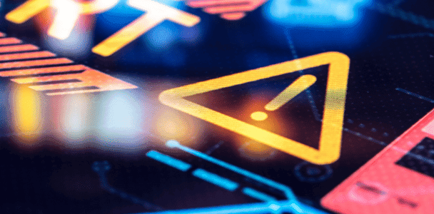 A vibrant digital interface displays a bold yellow warning triangle with an exclamation mark, amidst abstract colorful lines and circuits, suggesting urgency.